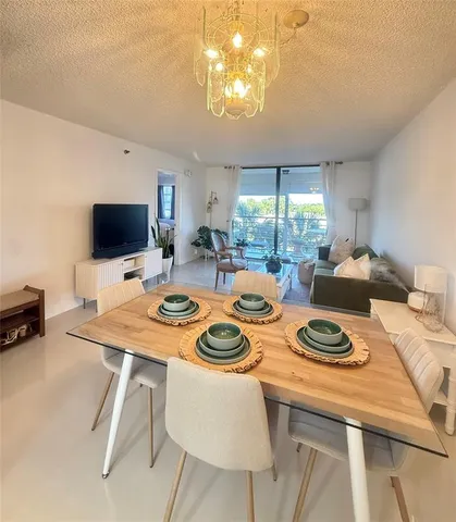 a view of a dining room with furniture