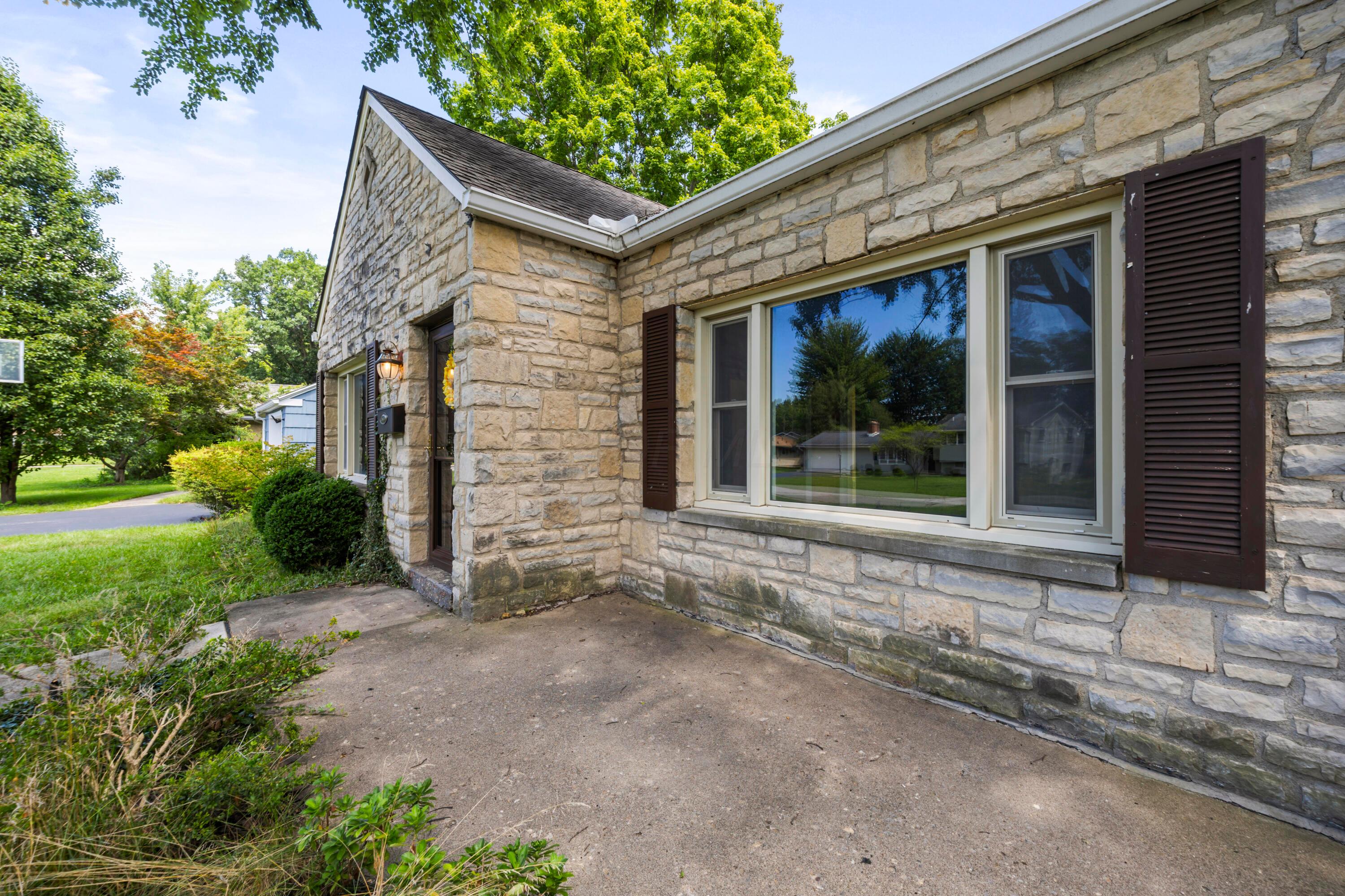 3260 Avalon Road Columbus, OH 43221 - Photo 9 of 46 Stone exterior with large multi-pane windows
