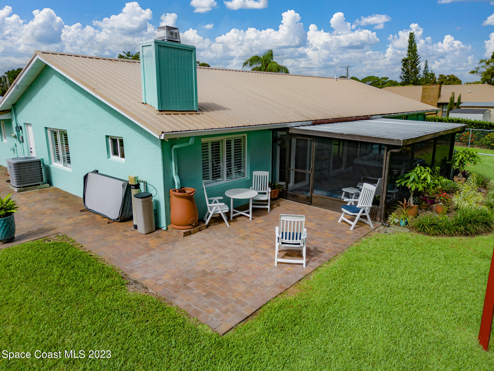 2900 Pine Branch Drive Melbourne, FL 32940 - Photo 34 of 48 a view of outdoor space yard deck patio and fire pit