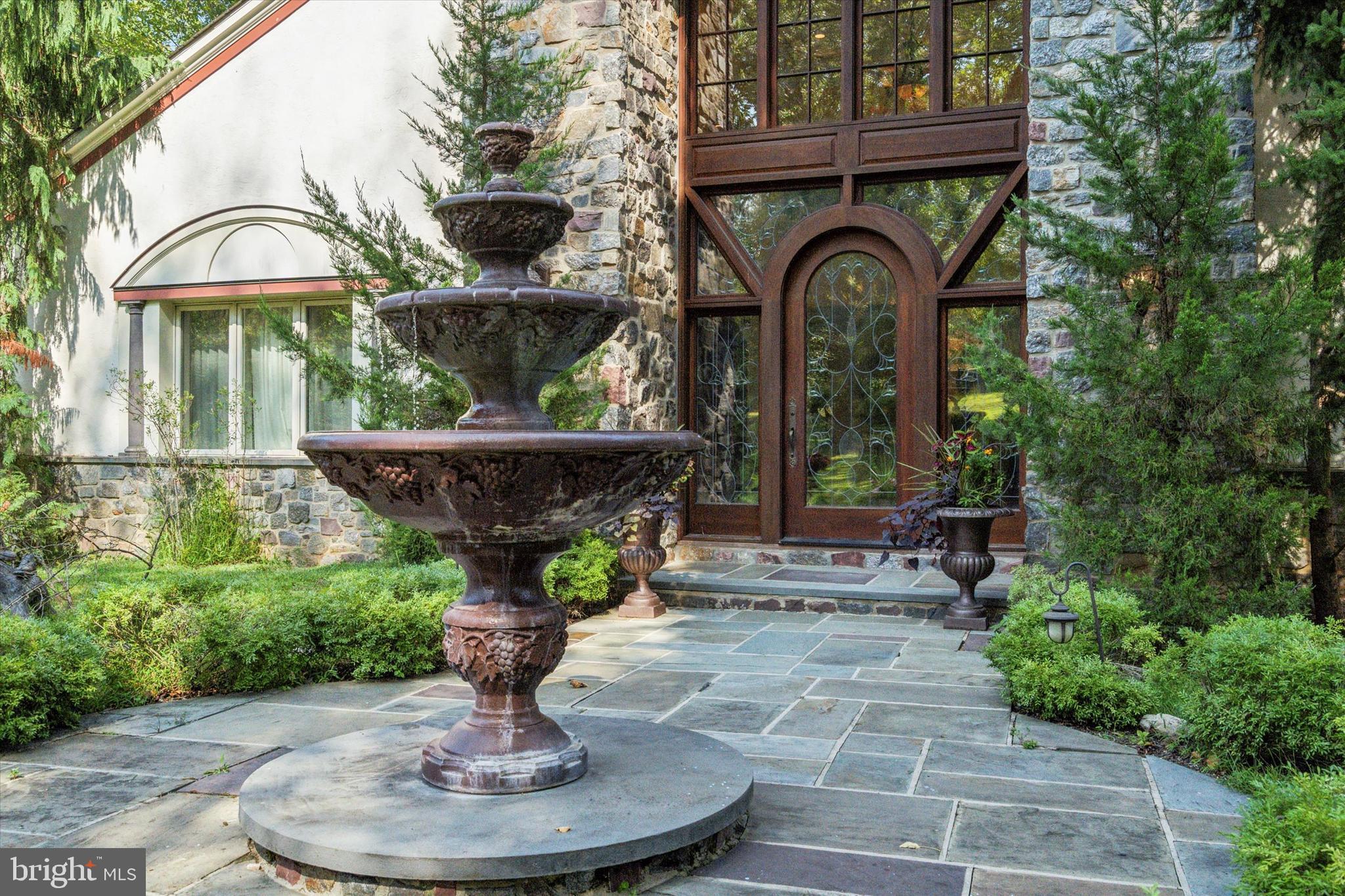 134 Springton Lake Road Media, PA 19063 - Photo 15 of 99 a front view of a house with fountain