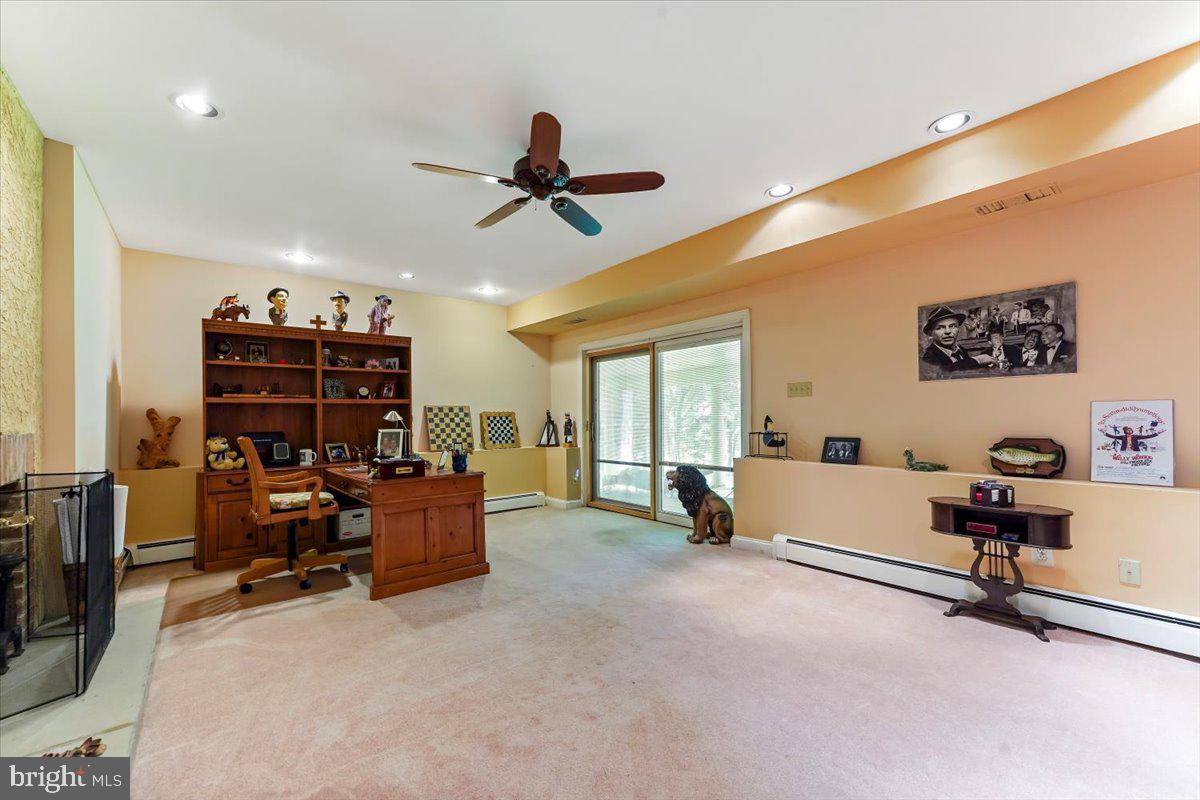 134 Springton Lake Road Media, PA 19063 - Photo 71 of 99 a view of a livingroom with workspace and a window