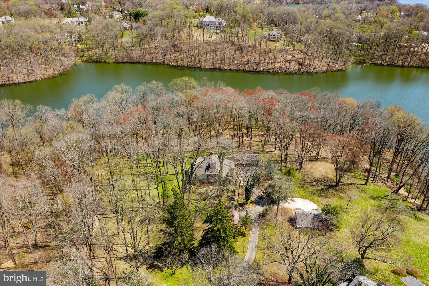 134 Springton Lake Road Media, PA 19063 - Photo 81 of 99 an aerial view of residential houses with outdoor space and lake view