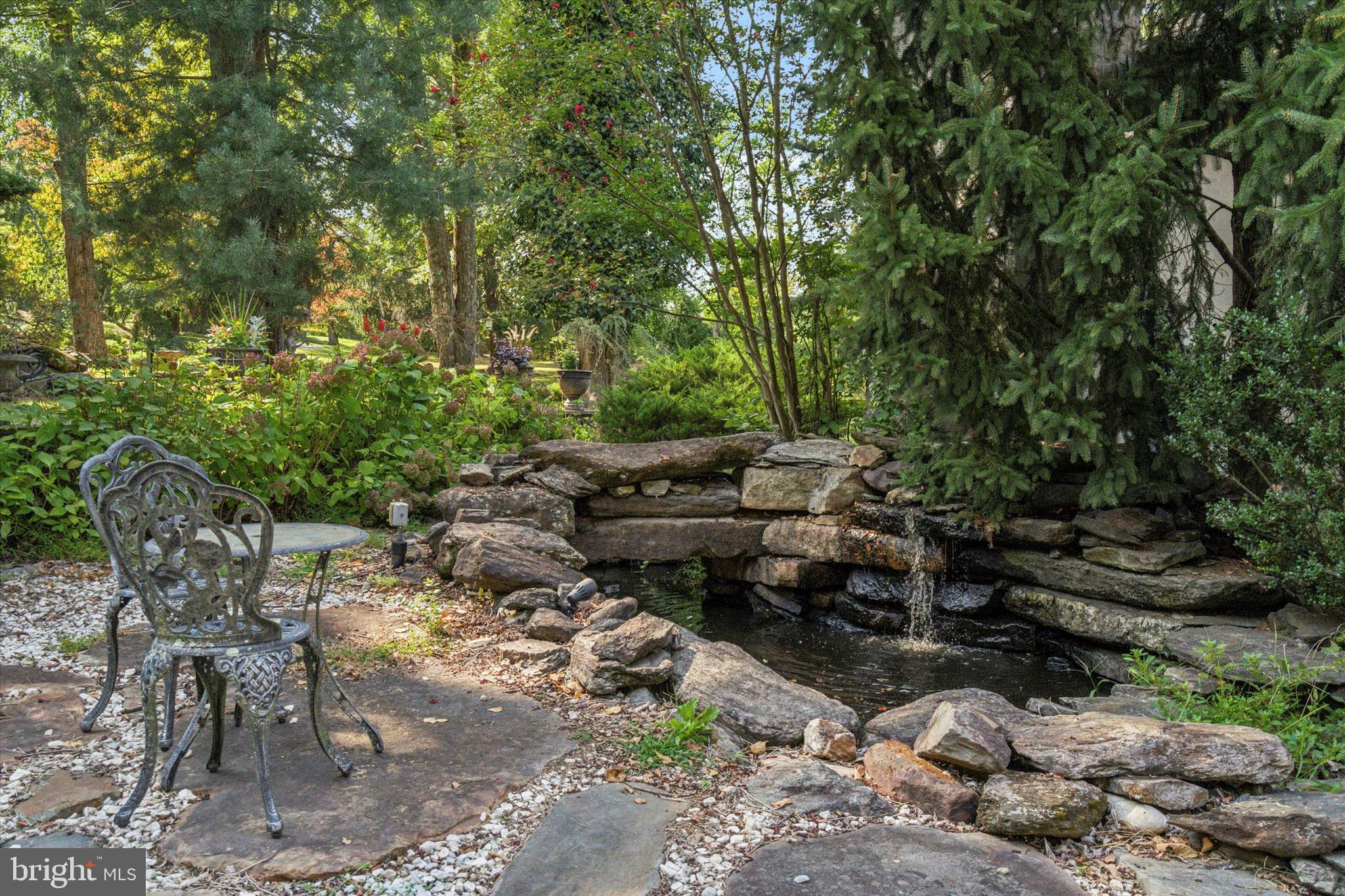 134 Springton Lake Road Media, PA 19063 - Photo 98 of 99 a garden view with a sitting space