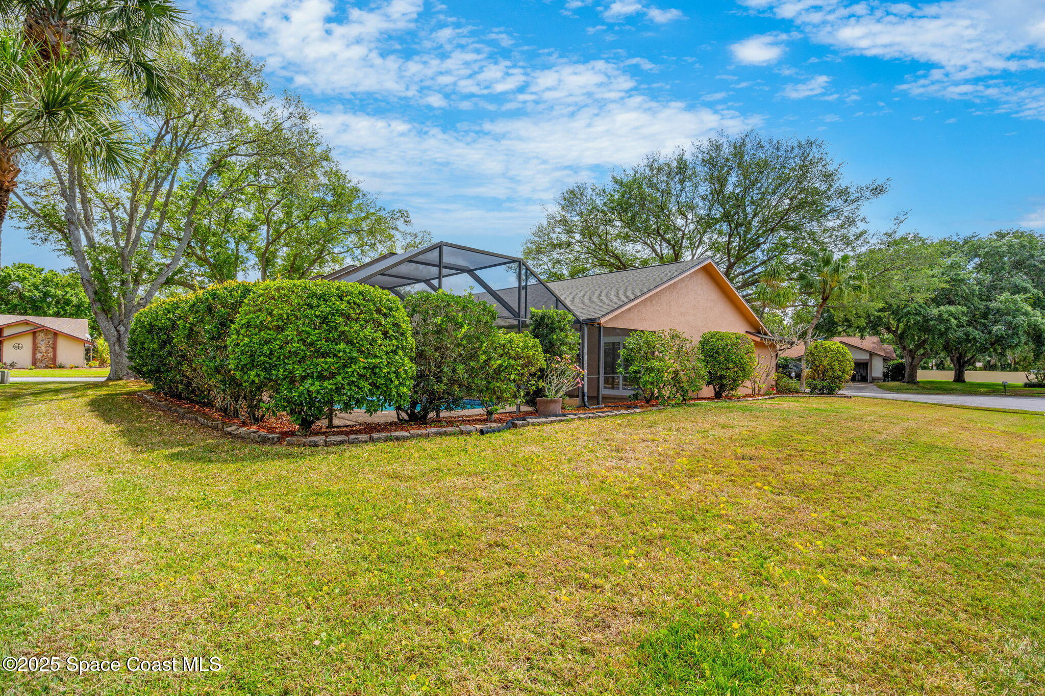 3700 Red Duck Place Melbourne, FL 32934 - Photo 35 of 47 a house with swimming pool in front of it