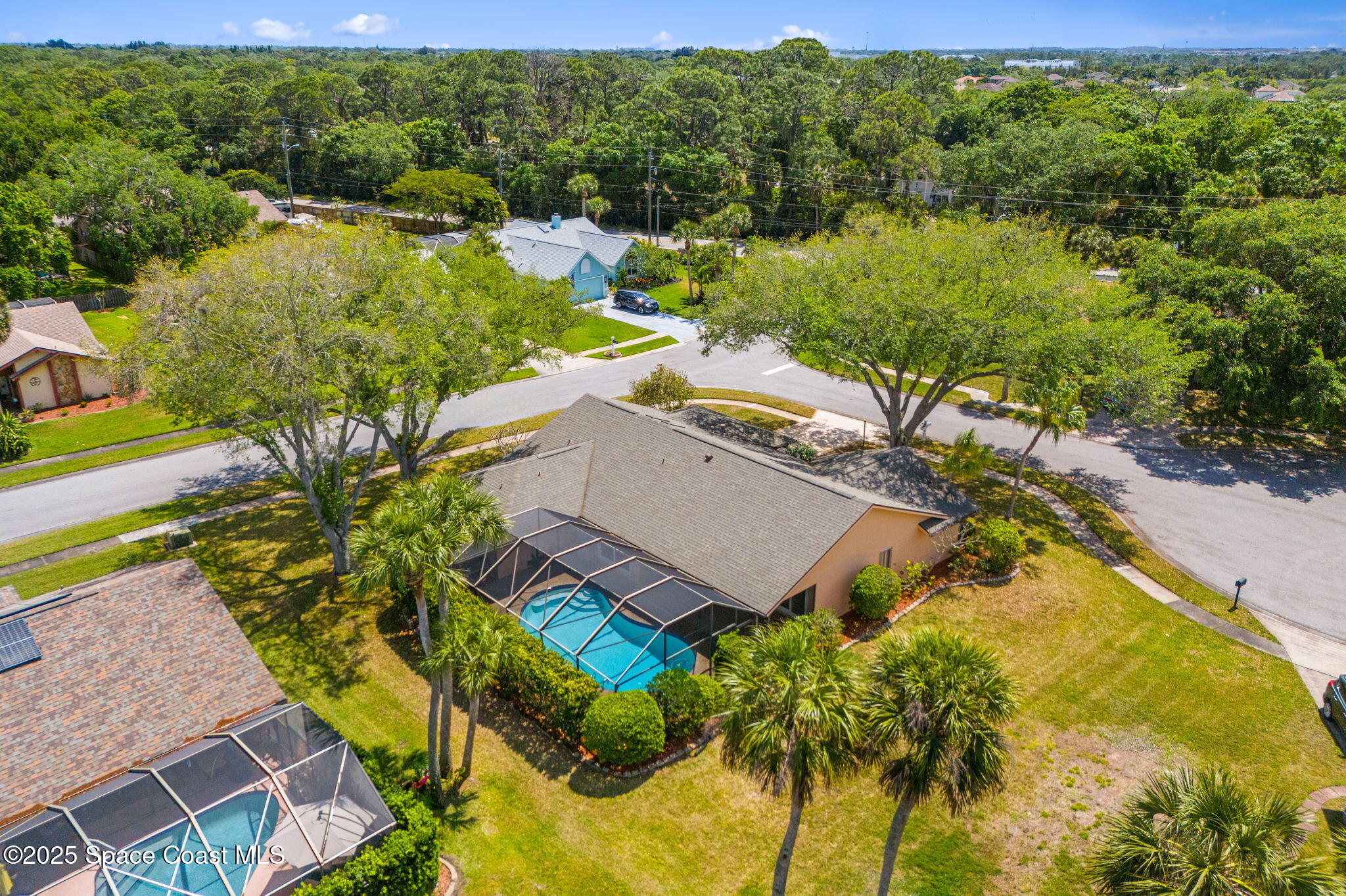 3700 Red Duck Place Melbourne, FL 32934 - Photo 5 of 47 an aerial view of a house with a yard