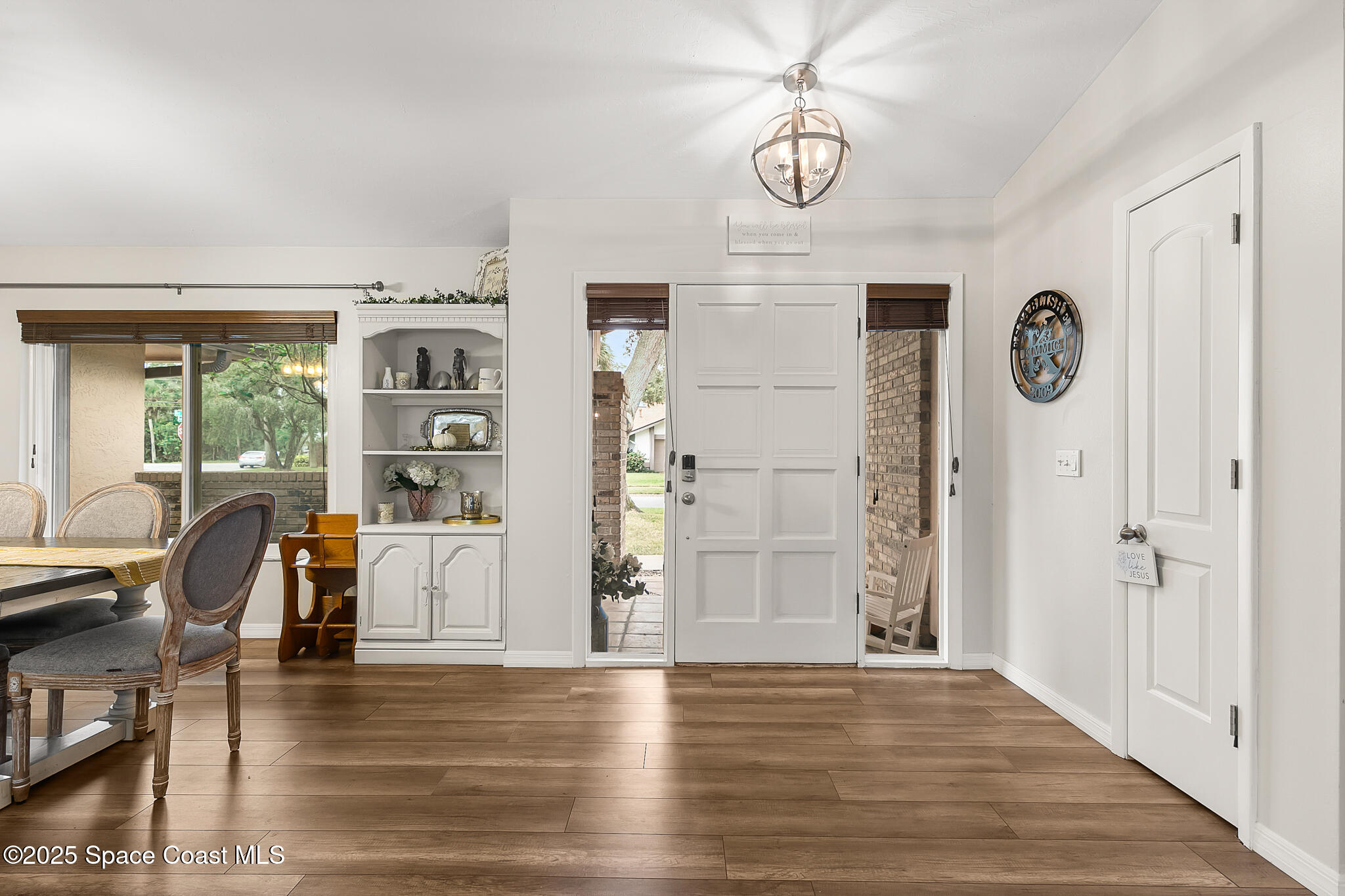 3700 Red Duck Place Melbourne, FL 32934 - Photo 6 of 47 a view of livingroom with furniture wooden floor and window