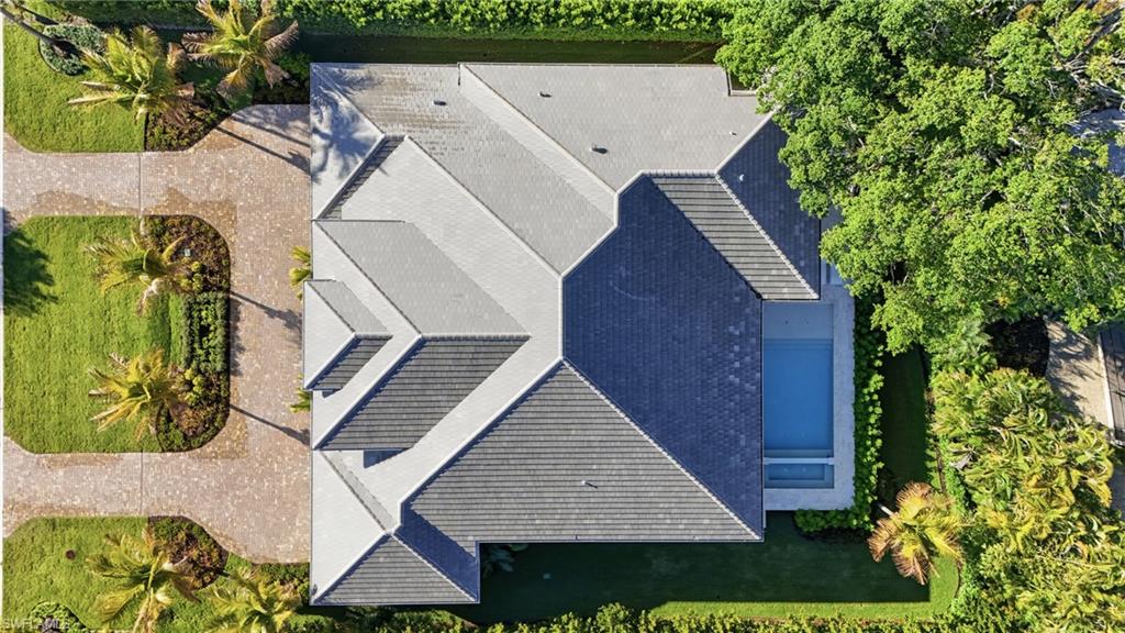 4851 Crayton Road Naples, FL 34103 - Photo 31 of 33 an aerial view of a house with a yard