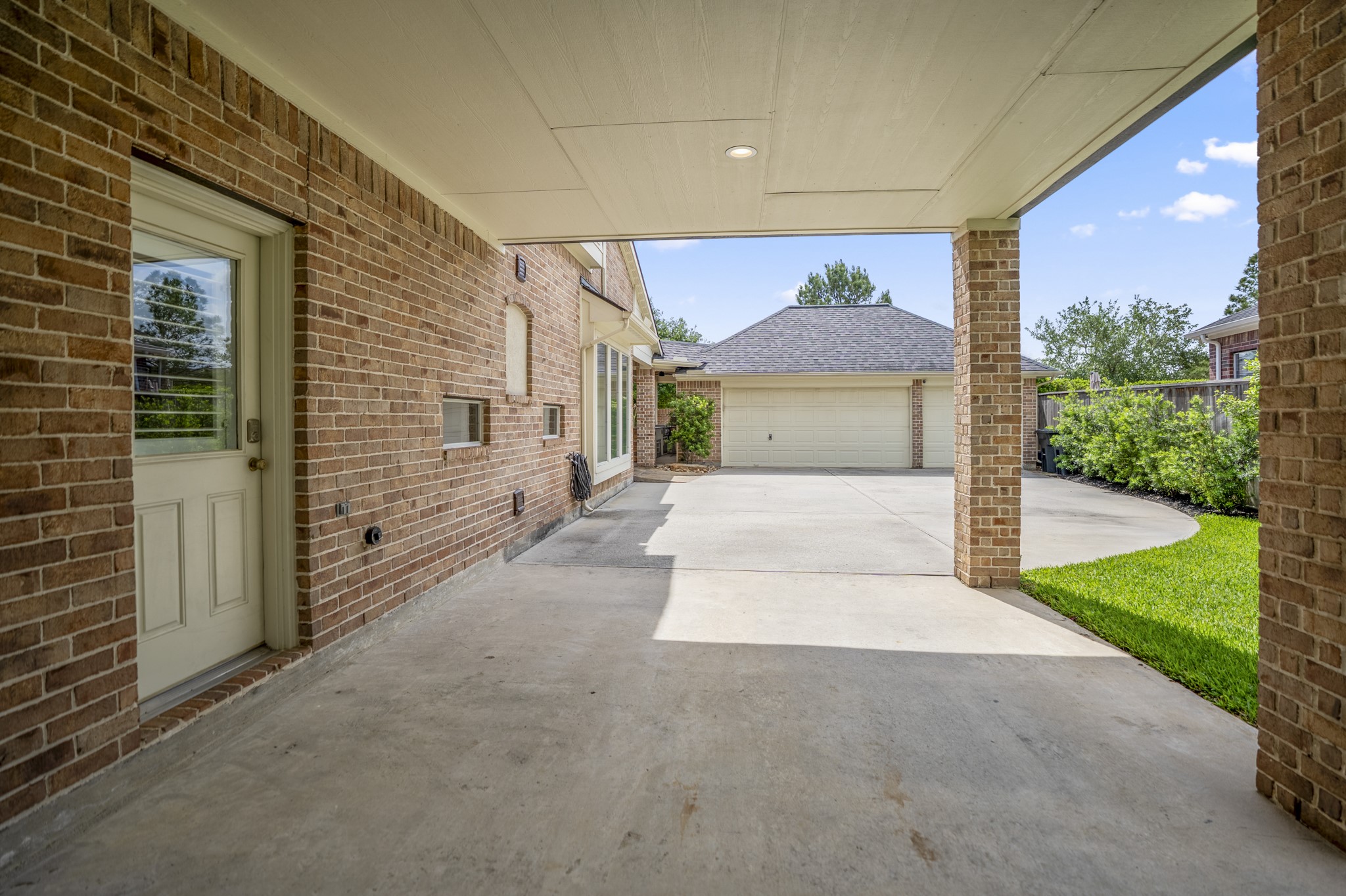 9707 Blue Cruls Way Spring, TX 77379 - Photo 11 of 50 a view of a brick house with a large windows