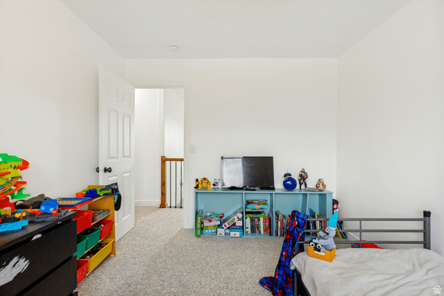 1585 South 910 West Payson, UT 84651 - Photo 21 of 32 Carpeted room with a white paneled door and light-colored walls