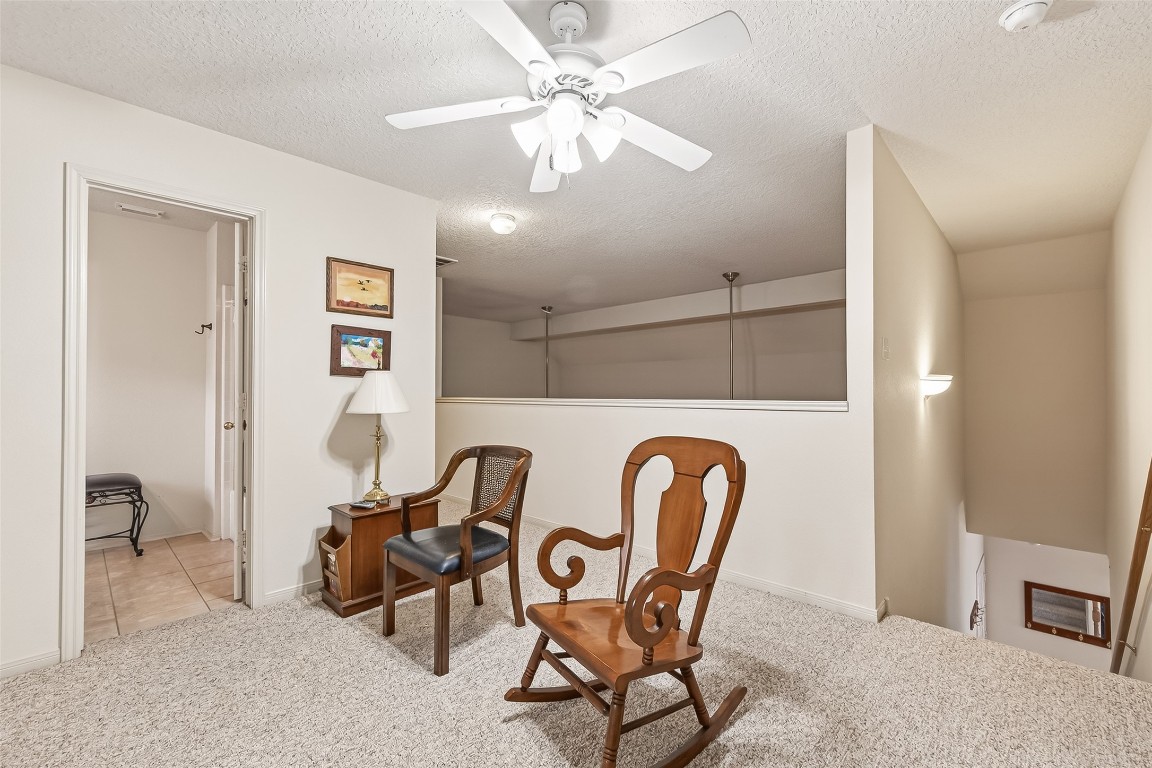 522 Beauregard Drive Conroe, TX 77302 - Photo 34 of 50 a view of a dining room with furniture and a chandelier fan