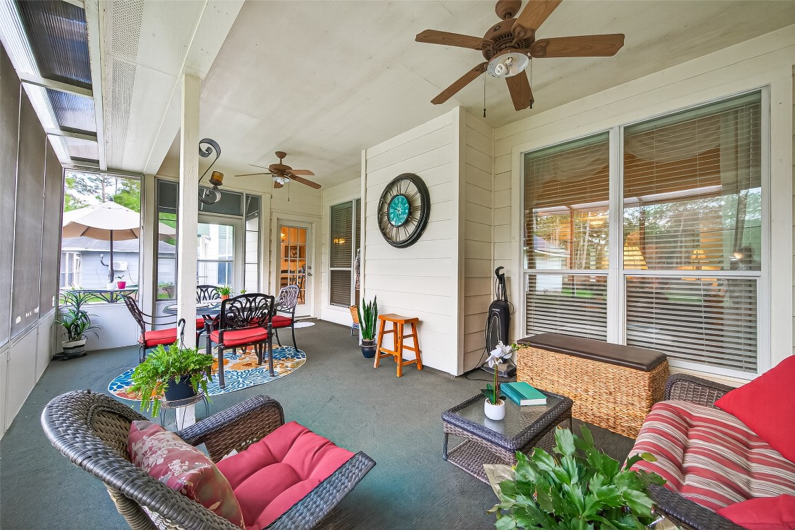 522 Beauregard Drive Conroe, TX 77302 - Photo 4 of 50 a living room with furniture and a table