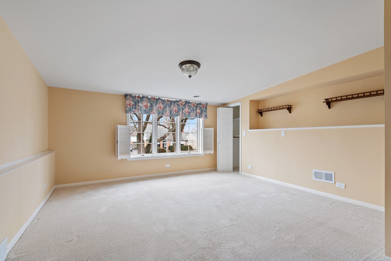 41 Hackberry Lane Glenview, IL 60025 - Photo 13 of 21 a view of an empty room with a window and closet area