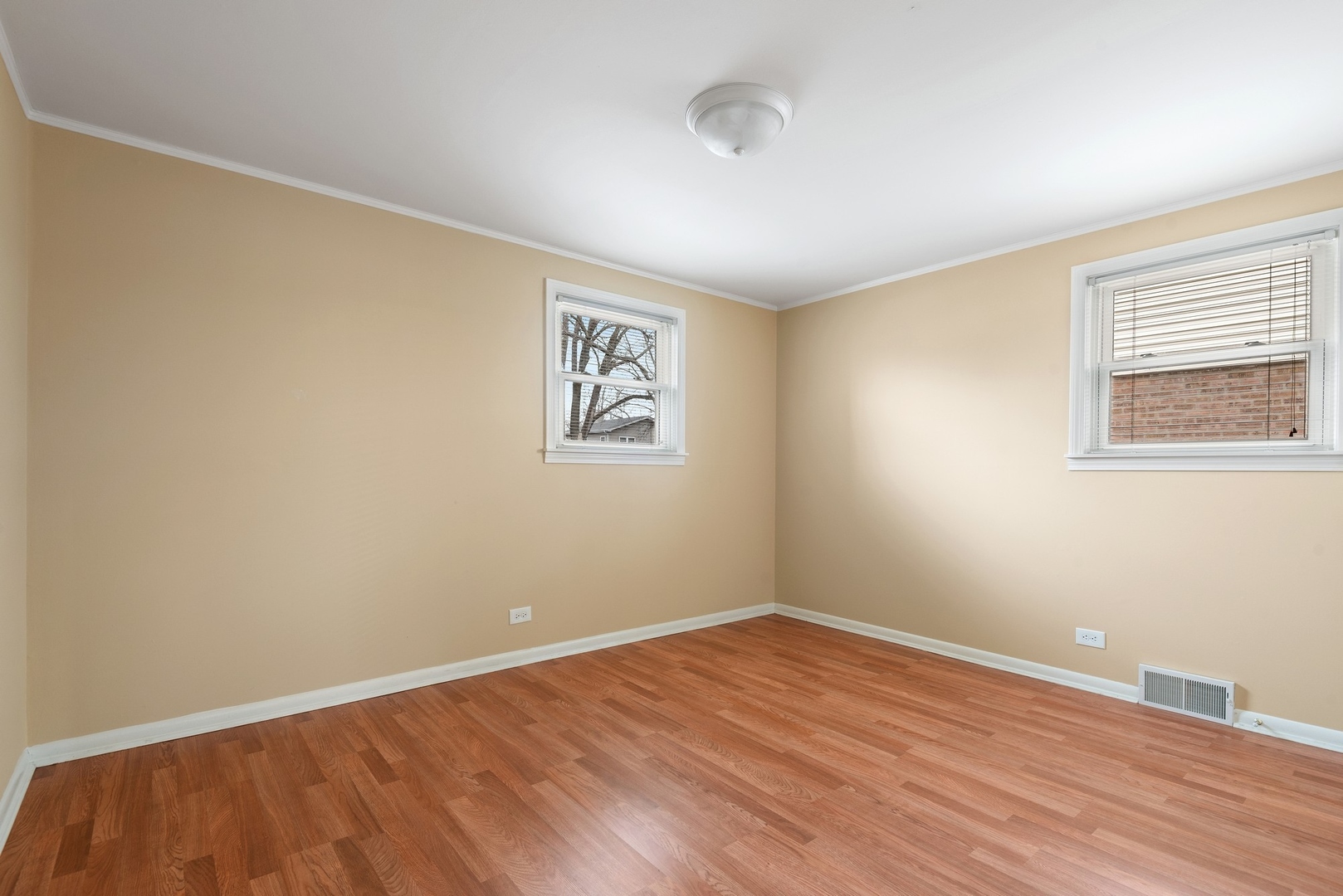 41 Hackberry Lane Glenview, IL 60025 - Photo 16 of 21 a view of an empty room with wooden floor and a window