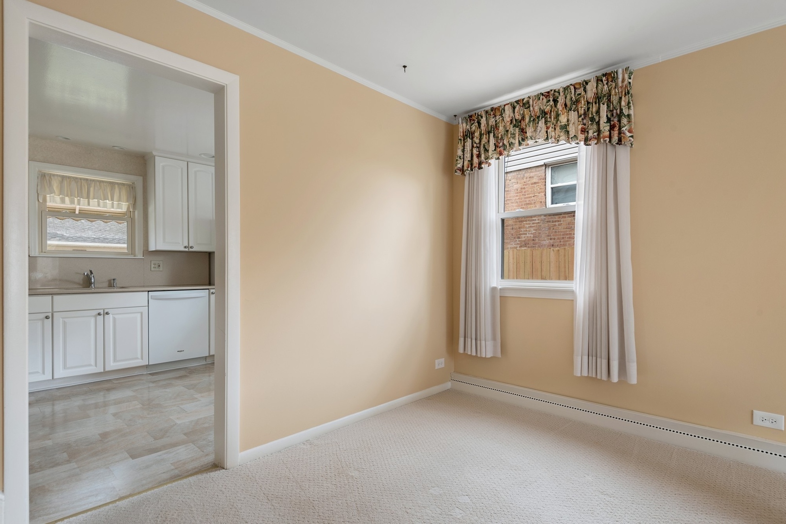 41 Hackberry Lane Glenview, IL 60025 - Photo 6 of 21 a view of an empty room with window and cabinet
