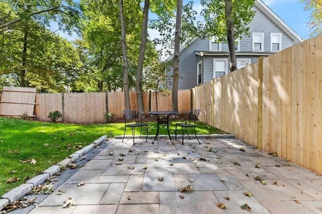 a view of a back yard with green space