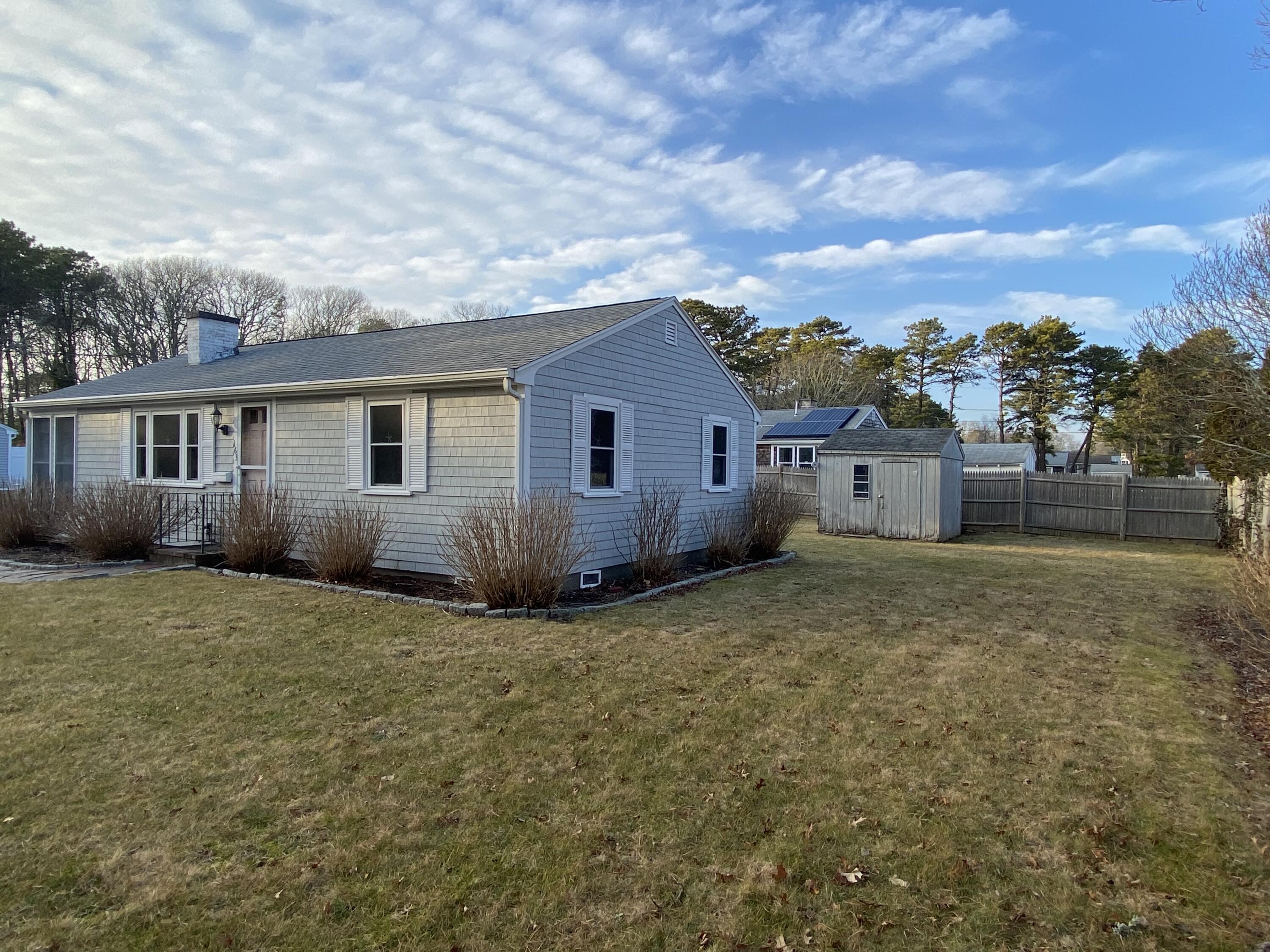 163 Breezy Point Road South Yarmouth, MA 02664 - Photo 33 of 40 a house view with a garden space