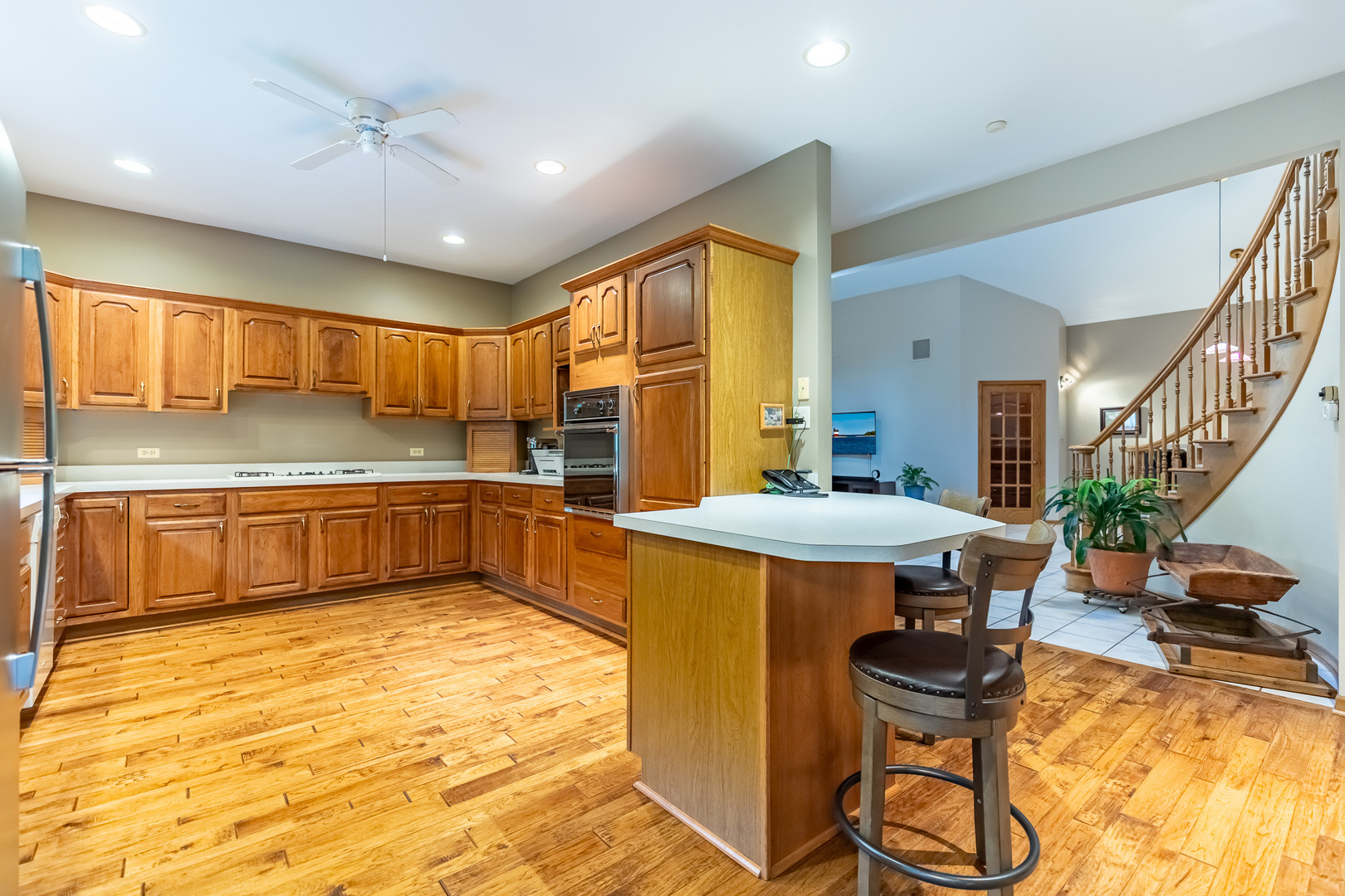 3530 East Challas Entrance Crete, IL 60417 - Photo 16 of 60 a large kitchen with a table and chairs