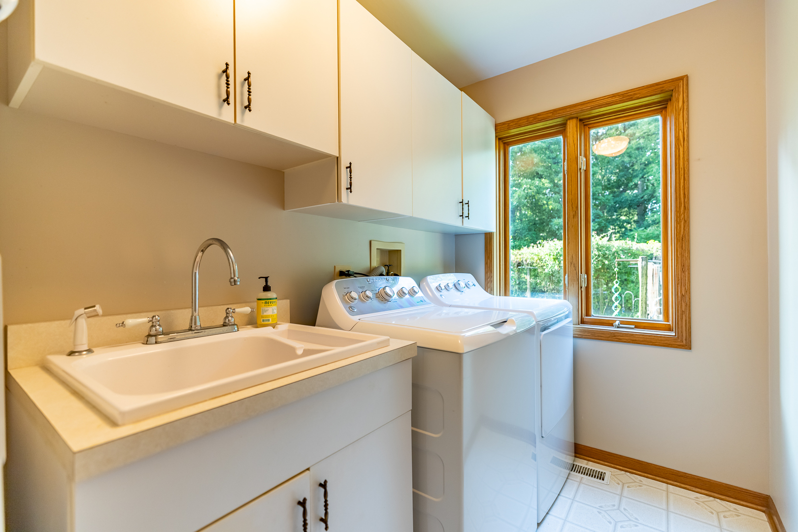 3530 East Challas Entrance Crete, IL 60417 - Photo 23 of 60 a utility room with sink dryer and washer
