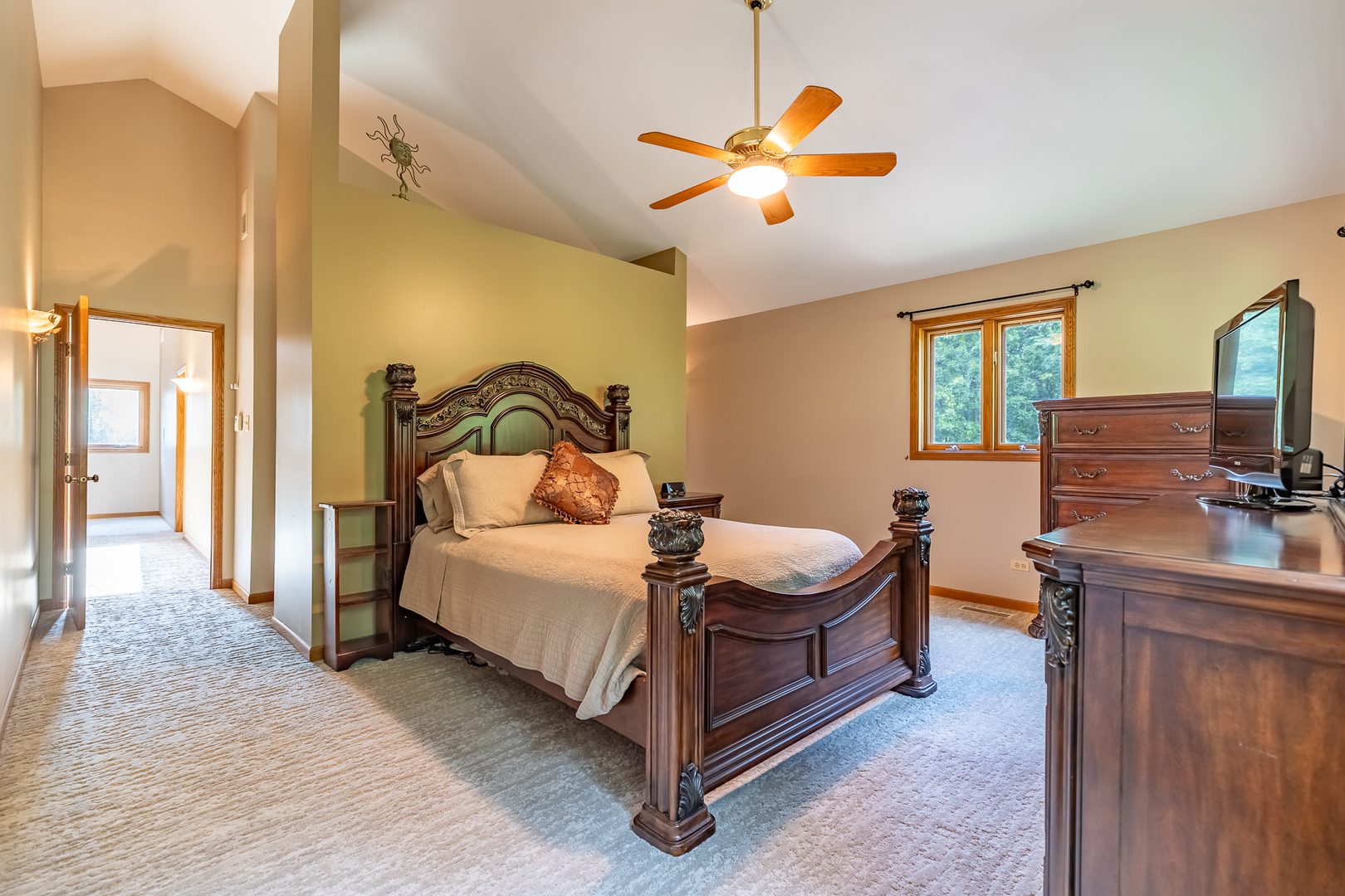 3530 East Challas Entrance Crete, IL 60417 - Photo 24 of 60 a bedroom with a bed and a flat tv screen on the dresser