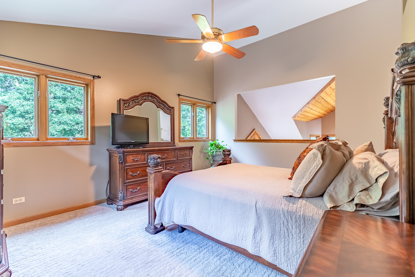 3530 East Challas Entrance Crete, IL 60417 - Photo 25 of 60 a bedroom with a bed and a flat tv screen on dresser