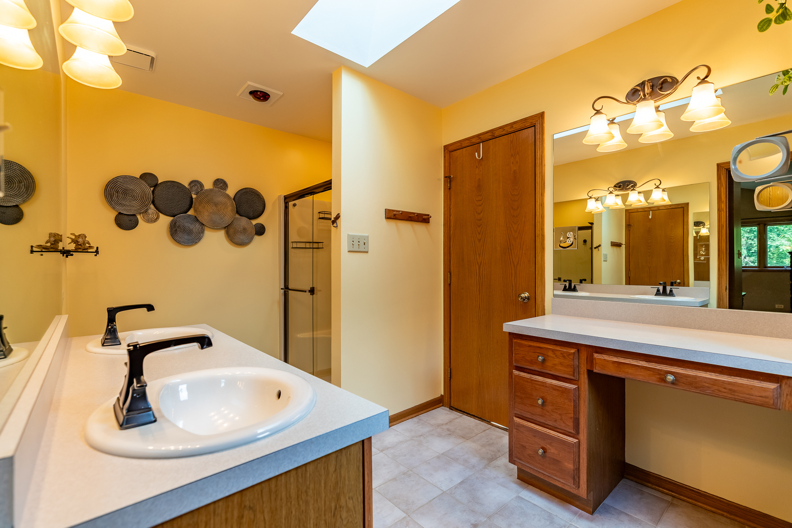 3530 East Challas Entrance Crete, IL 60417 - Photo 34 of 60 a bathroom with a sink and a mirror