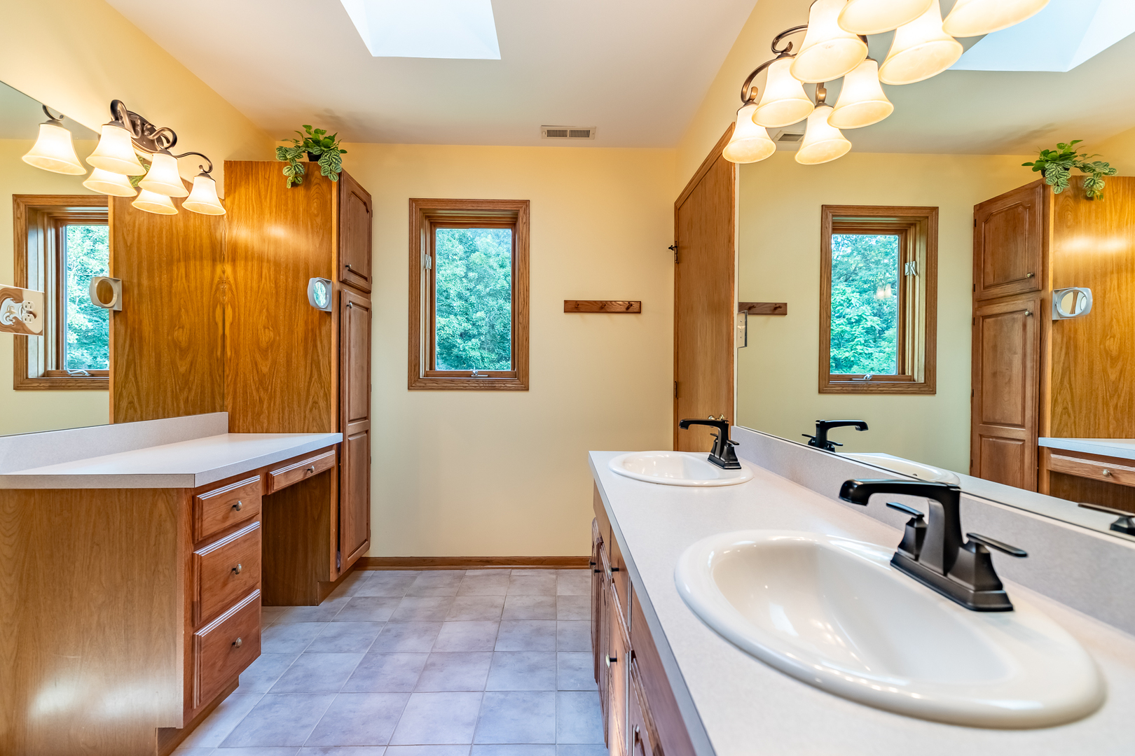 3530 East Challas Entrance Crete, IL 60417 - Photo 35 of 60 a bathroom with a sink and a mirror
