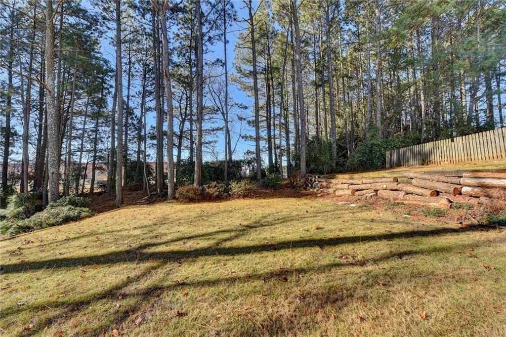 2390 Walnut Grove Way Suwanee, GA 30024 - Photo 22 of 22 a view of swimming pool with trees