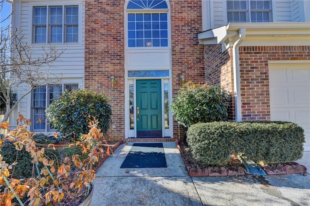 2390 Walnut Grove Way Suwanee, GA 30024 - Photo 3 of 22 a front view of a house