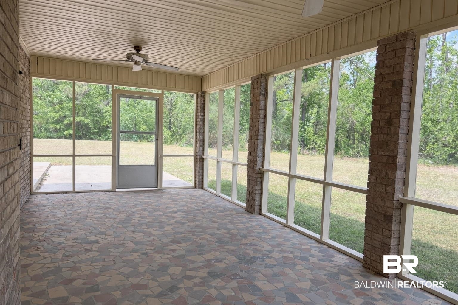 294 Wolf Log Road Flomaton, AL 36441 - Photo 2 of 14 Unfurnished sunroom featuring a ceiling fan
