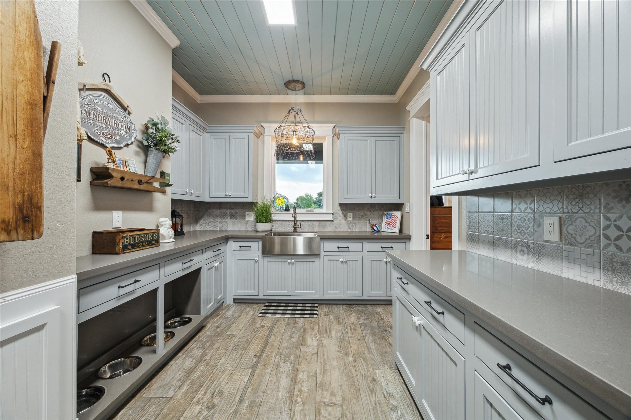 1255 Bronco Trail Angleton, TX 77515 - Photo 25 of 50 a kitchen with a sink stove and cabinets