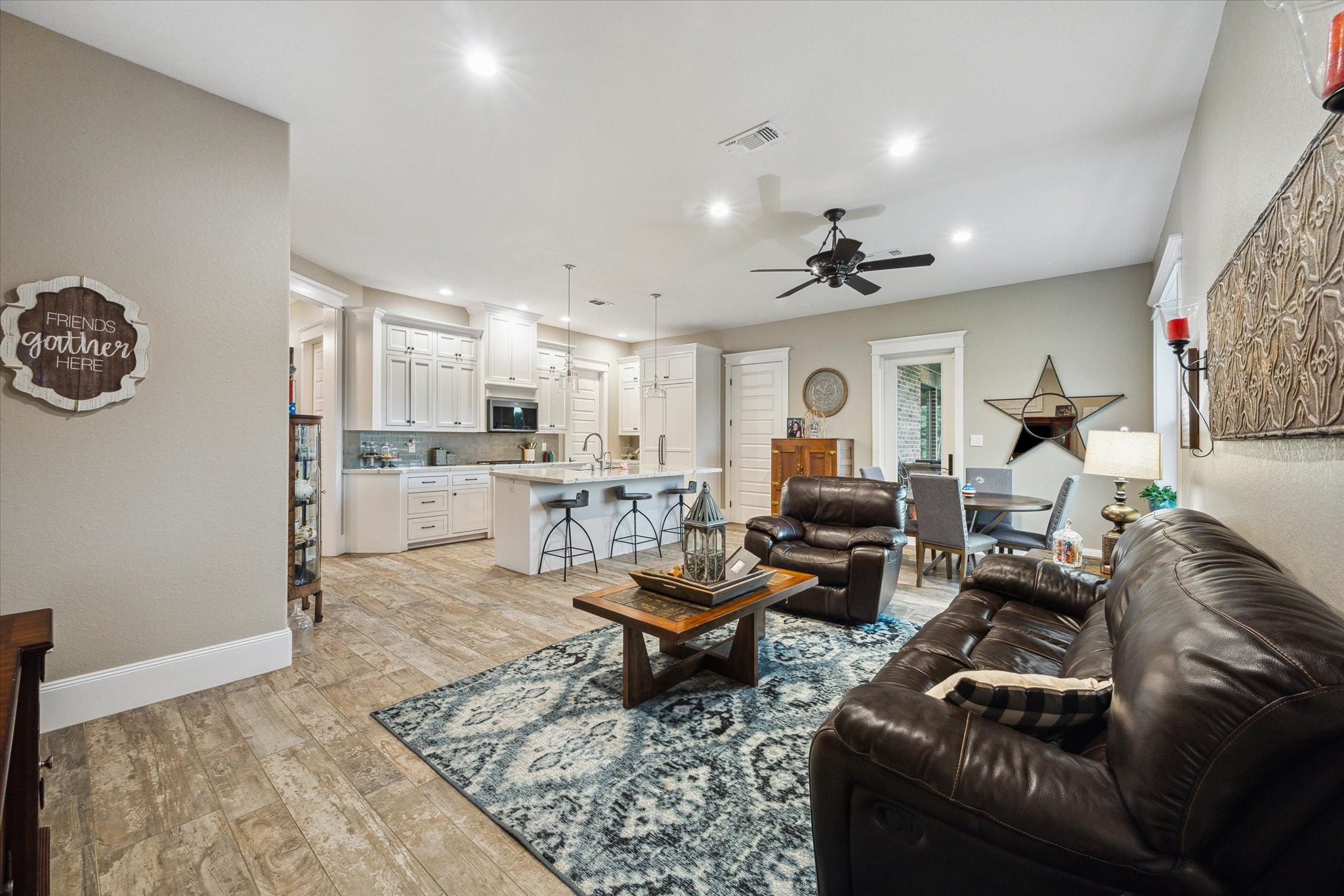 1255 Bronco Trail Angleton, TX 77515 - Photo 36 of 50 a living room with furniture and a flat screen tv
