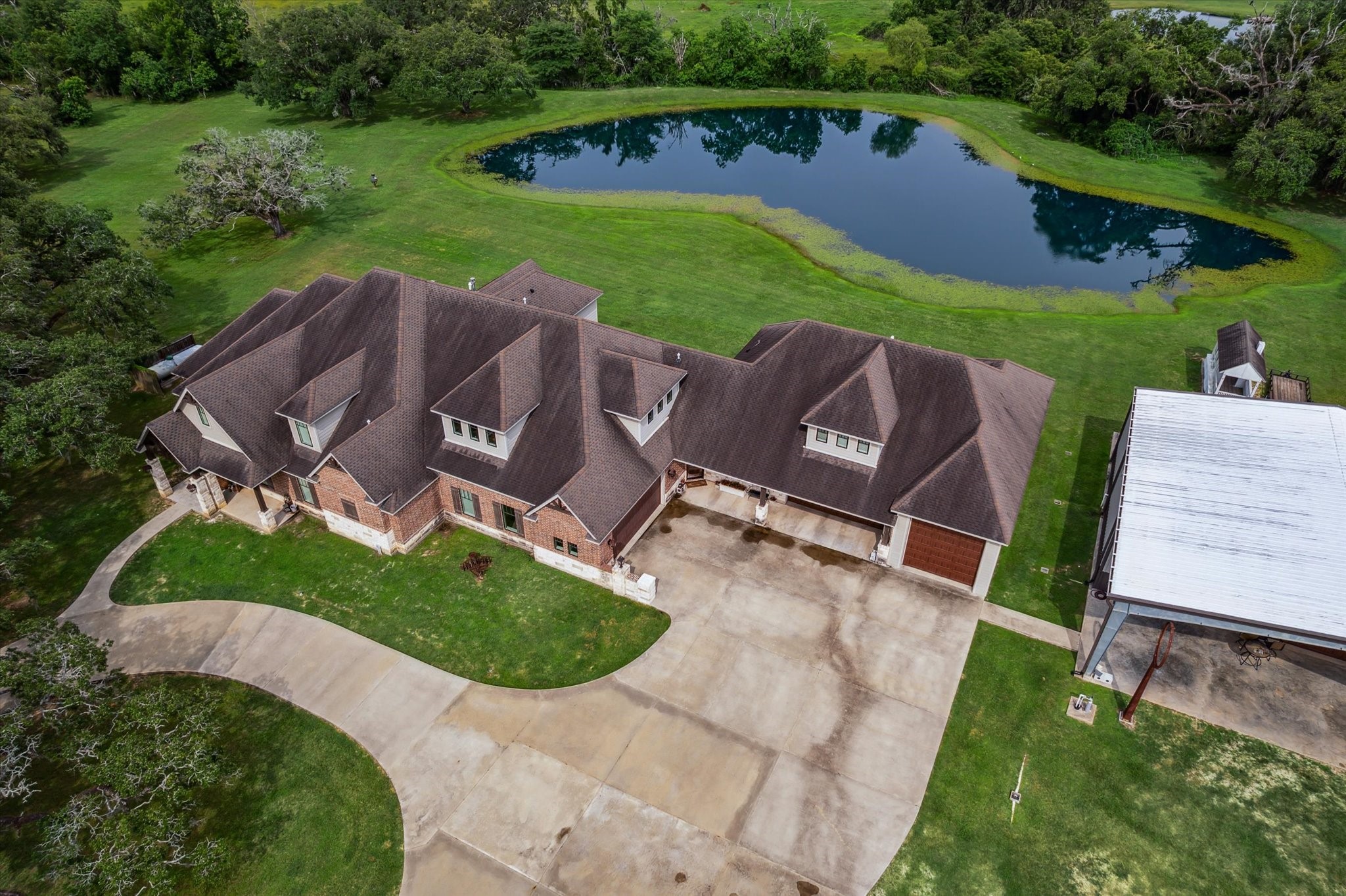 1255 Bronco Trail Angleton, TX 77515 - Photo 45 of 50 an aerial view of a house with backyard