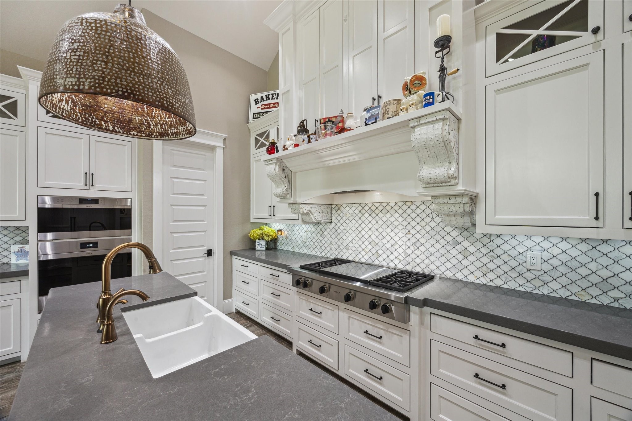 1255 Bronco Trail Angleton, TX 77515 - Photo 8 of 50 a kitchen with stainless steel appliances granite countertop a sink and a stove