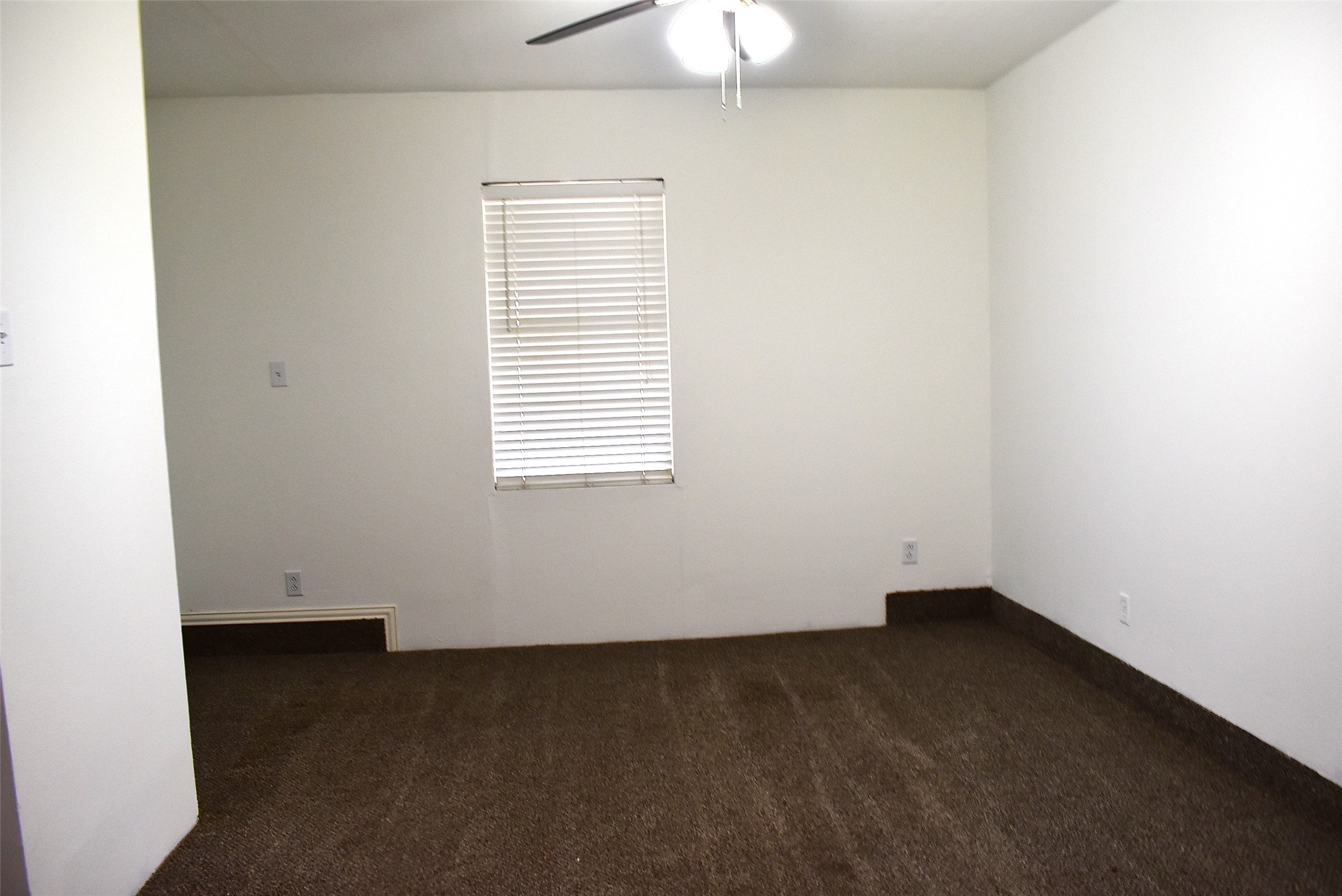 1006 Mac Drive Sweeny, TX 77480 - Photo 15 of 43 an empty room with a window