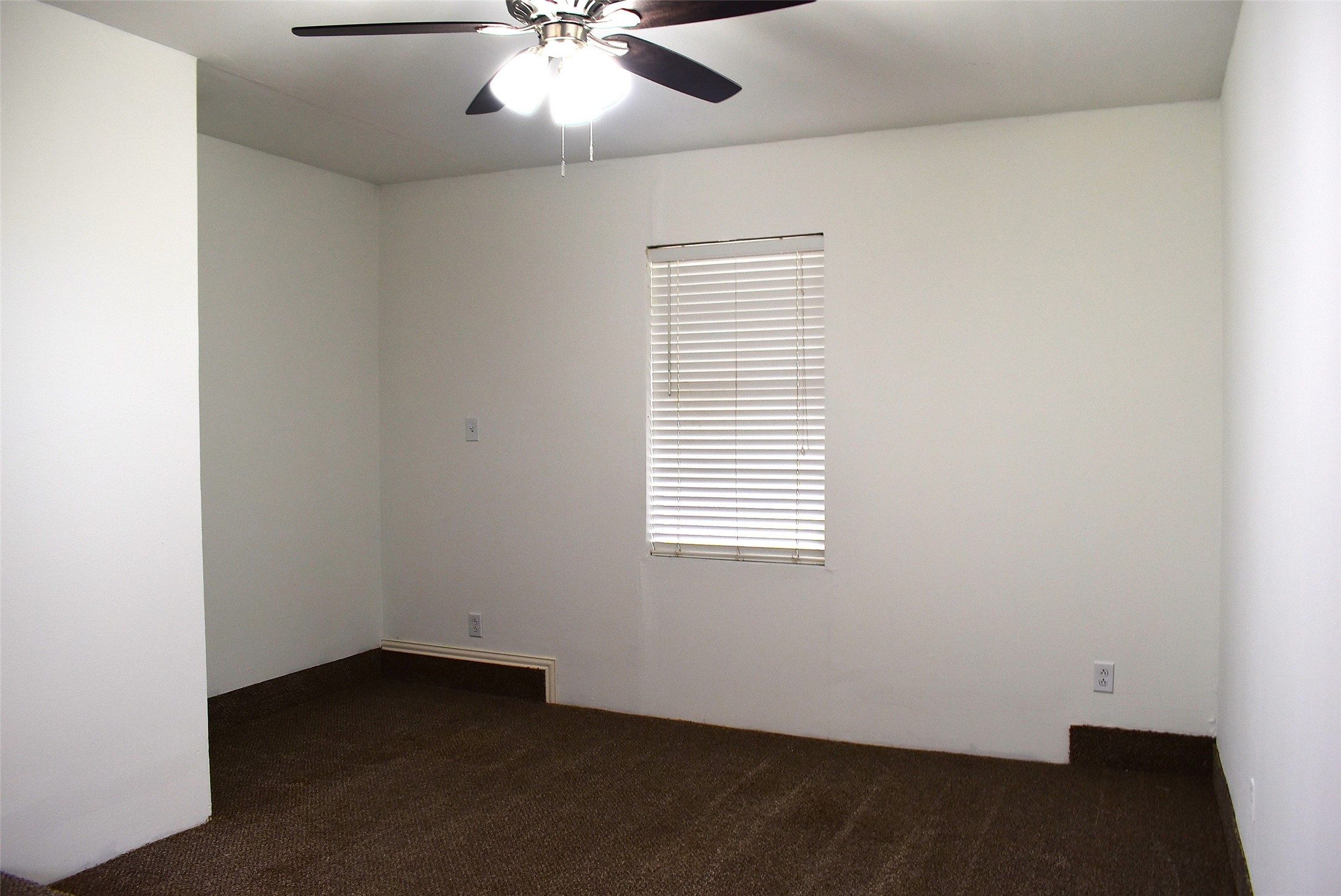 1006 Mac Drive Sweeny, TX 77480 - Photo 16 of 43 an empty room with a window