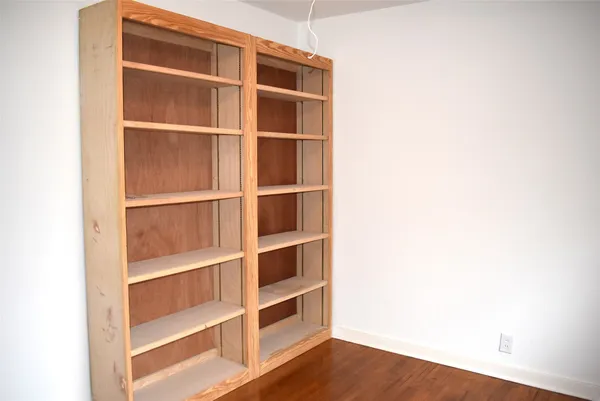 a view of an empty room with empty racks