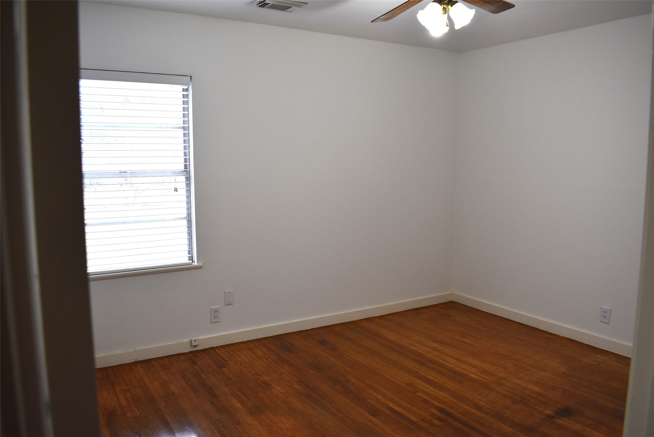 1006 Mac Drive Sweeny, TX 77480 - Photo 33 of 43 an empty room with a window