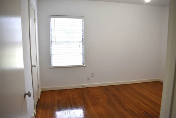 a view of a room that has a window