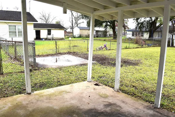 a view of a porch with a back yard