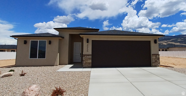 4956 North 925 East, Unit 87 Enoch, UT 84721 - Photo 1 of 19 Contemporary stucco exterior with a dark asphalt shingle roof