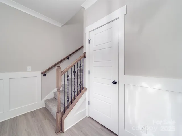 a view of a hallway with staircase