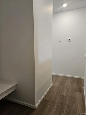 a view of small space with wooden floor