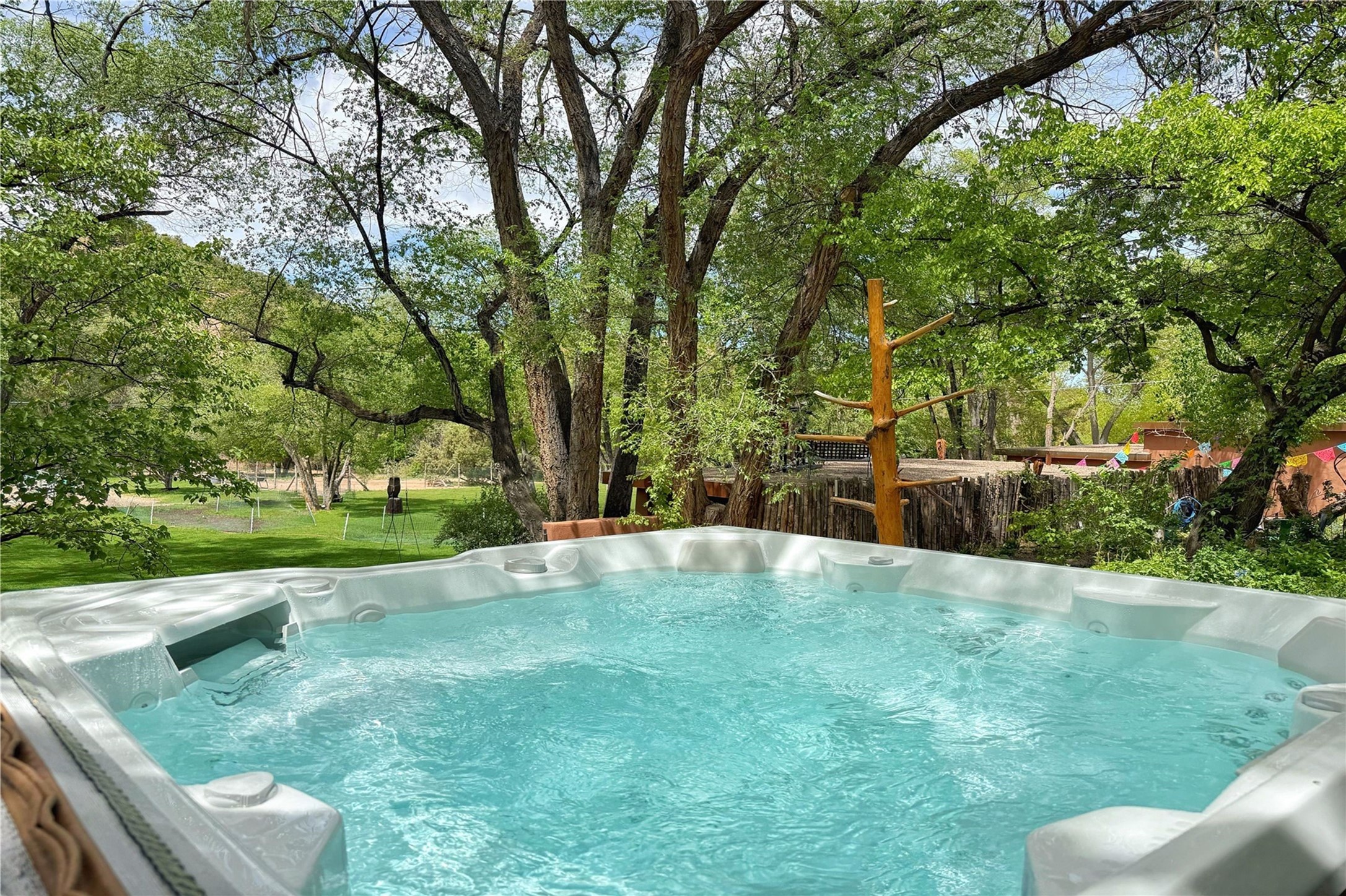1352 Bishops Lodge Road Santa Fe, NM 87506 - Photo 62 of 66 hot tub/ back garden