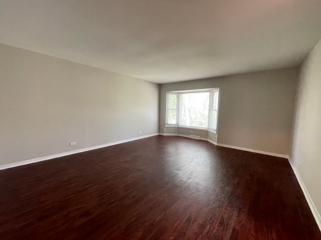 529 Jordan Way Bolingbrook, IL 60440 - Photo 13 of 23 a view of empty room with wooden floor and fan