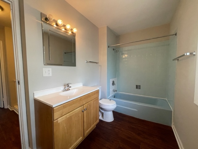 529 Jordan Way Bolingbrook, IL 60440 - Photo 20 of 23 a bathroom with a sink toilet a mirror and shower