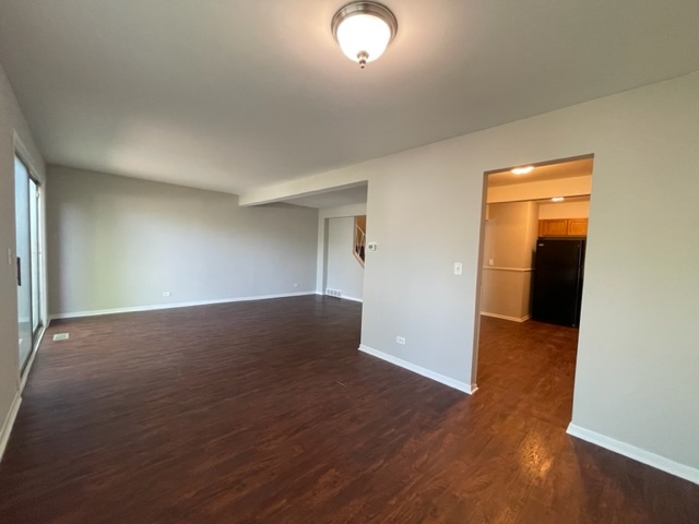 529 Jordan Way Bolingbrook, IL 60440 - Photo 8 of 23 an empty room with wooden floor and closet