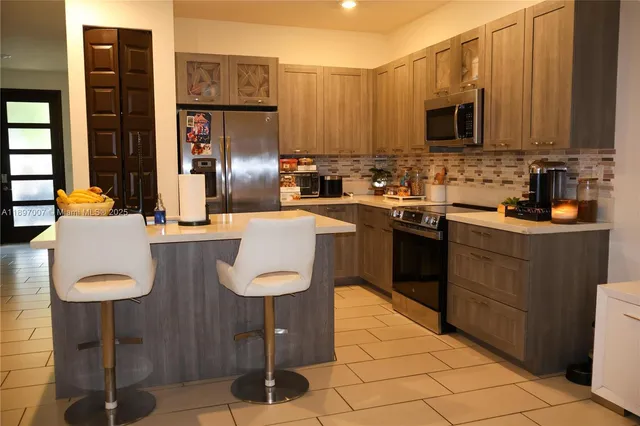 $570,000 | 15930 Northwest 91st Court, Miami Lakes, FL 33018