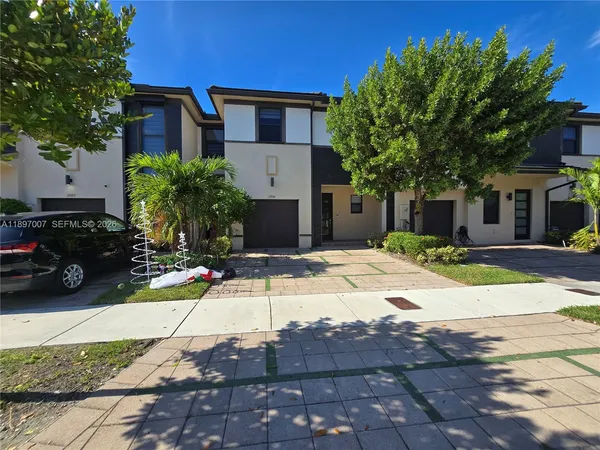 a house view with a outdoor space