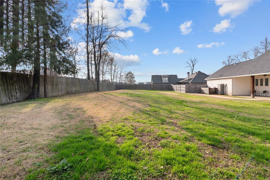 550 Ramsey Road Stonewall, LA 71078 - Photo 39 of 40 a swimming pool with outdoor seating and yard