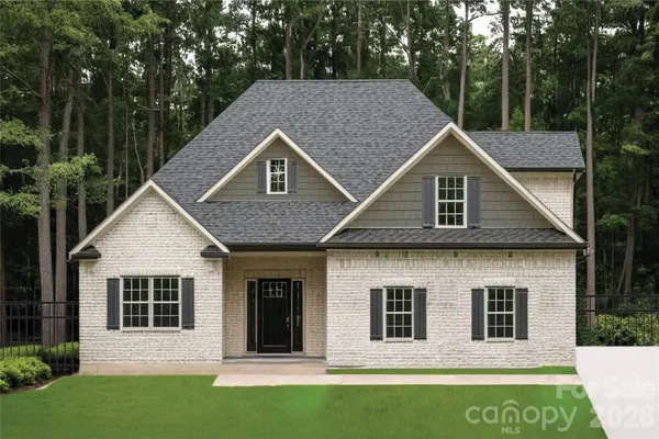 a house view with a garden space